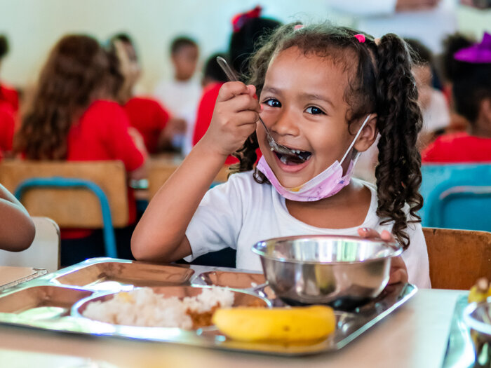 School girl eats her lunch provided by WFP at a school in Miranda municipality, Falcon state, Venezuela.